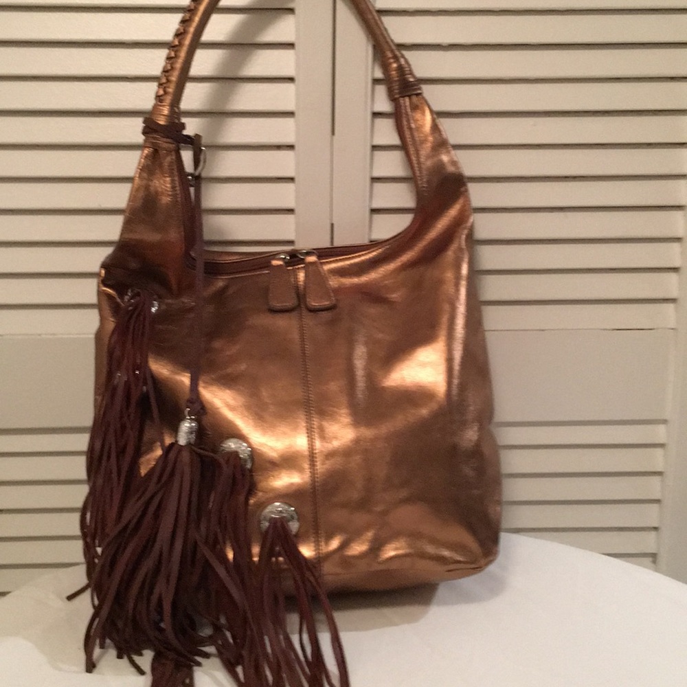 Chi by Falchi shoulder bag with leather fringe.